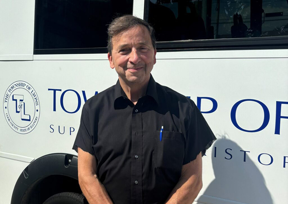 person in front of van