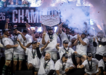 Chicago Hounds players celebrate with the MLR shield after winning the game.